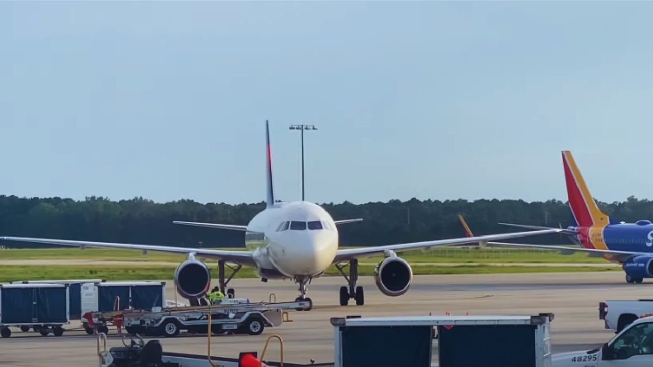 Airport Chaos: Delta Connection Passenger Arrested for Disturbing Peace